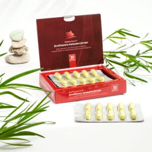 ZeroHistamine Antioxidant Napfeny, imagine secundara produs, cutie cu capsule supliment pentru intoleranta la histamina pe fundal alb, ornament frunze.