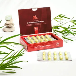ZeroHistamine Antioxidant Napfeny, imagine secundara produs, cutie cu capsule supliment pentru intoleranta la histamina pe fundal alb, ornament frunze.